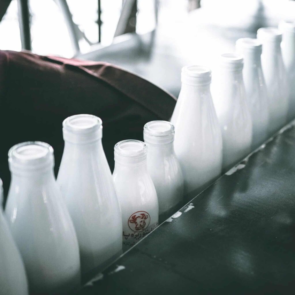 Reusable glass milk bottle
