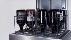 Spirits bottles on the washer nozzles